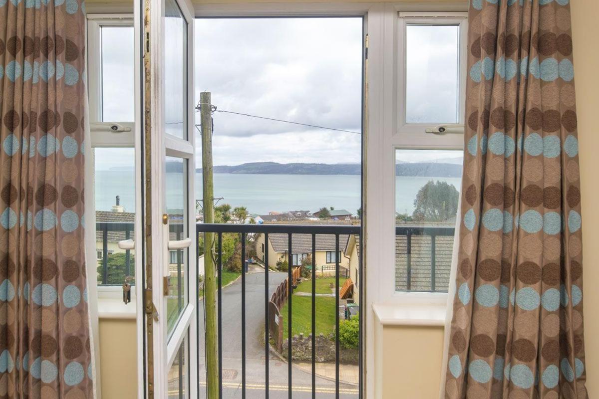 The Penthouse Villa Benllech Bagian luar foto